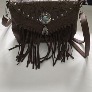 Elegant Brown Crossbody Bag with Fringe and Embellishments
